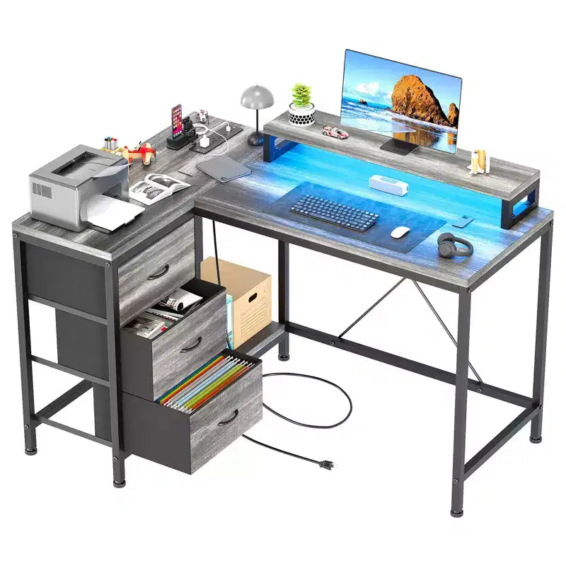 Bureau d'angle en L avec éclairage RVB, prises électriques, tiroirs et étagères