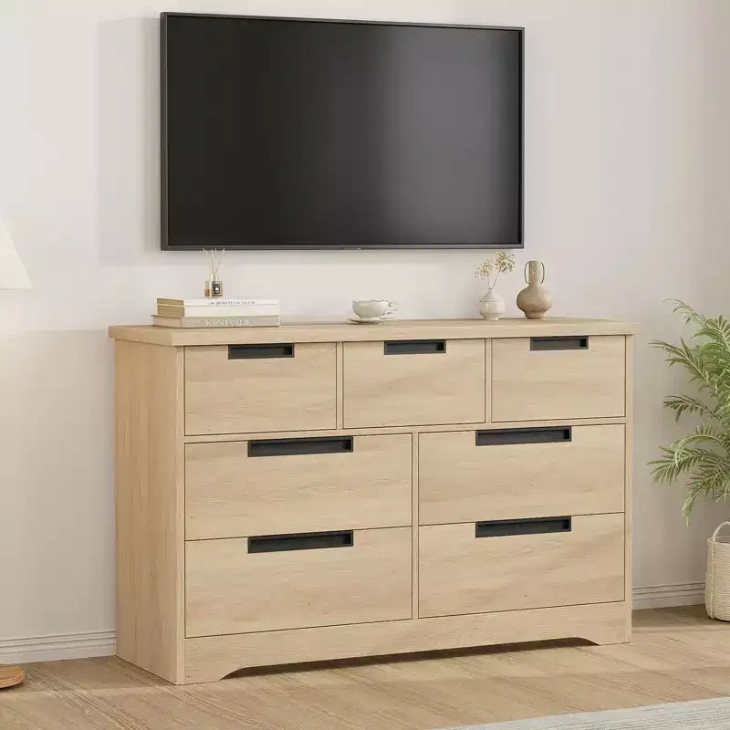 Commode à 7 tiroirs avec poignées intégrées