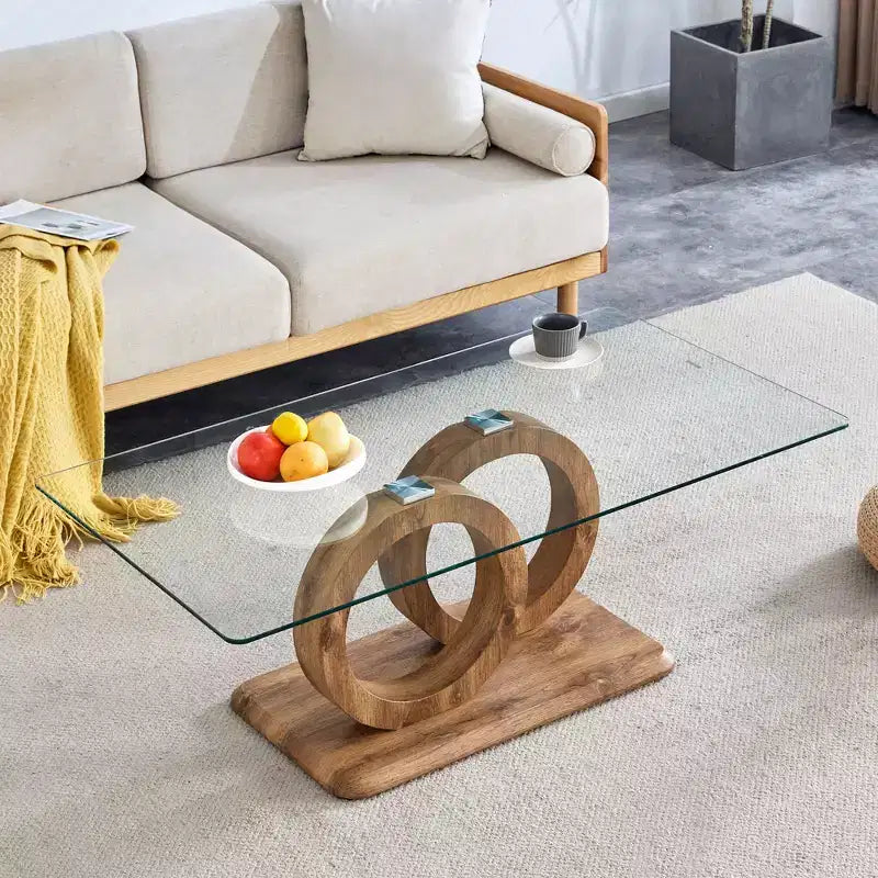 Table basse en verre avec piètement annulaire en MDF