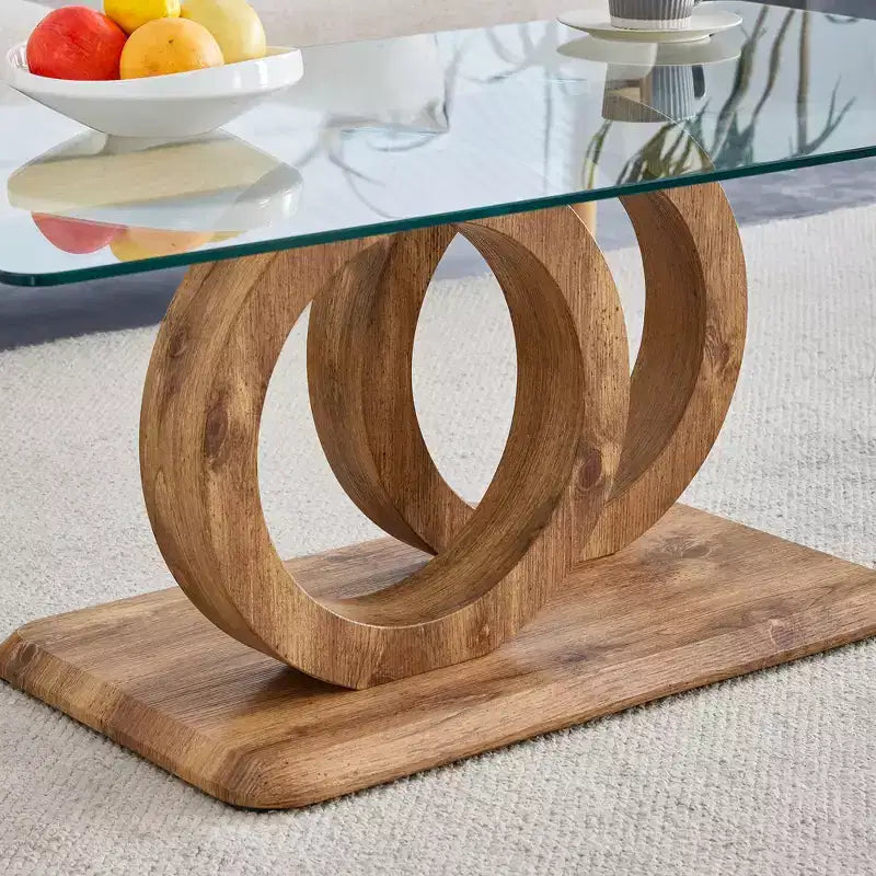 Table basse en verre avec piètement annulaire en MDF