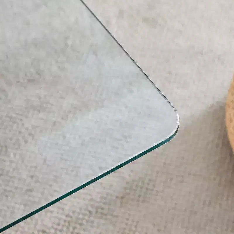 Table basse en verre avec piètement annulaire en MDF