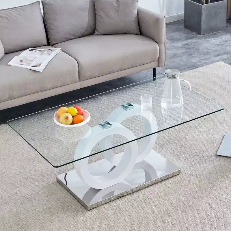 Table basse en verre avec piètement annulaire en MDF